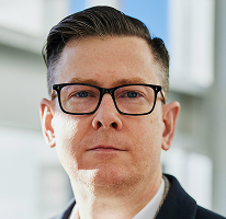 Portret izvršnog direktora Alexander Hughes, CEO kripto trgovačke tvrtke